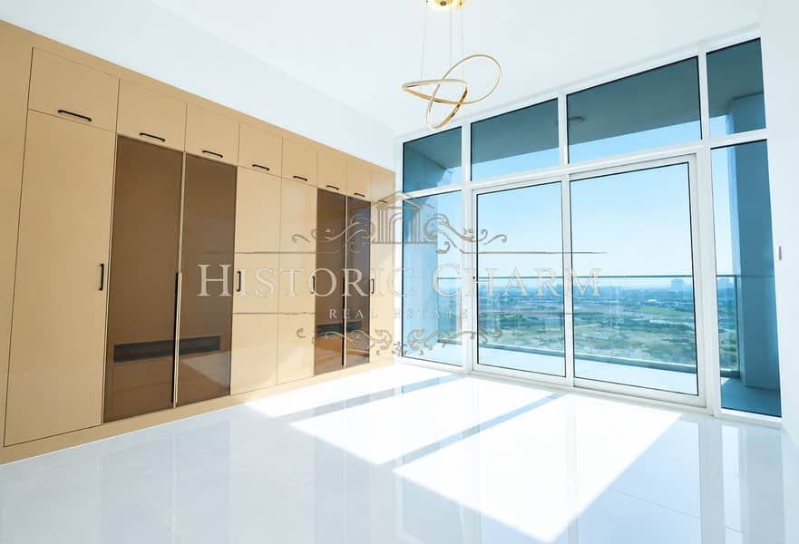 4 Sunlit Modern Bedroom with City Views. png