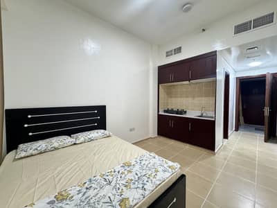 Studio for Rent in Bur Dubai, Dubai - Fully Furnished Studios Near Sharaf DG Metro | DEWA & Wi-Fi Included | Family & Bachelor Options