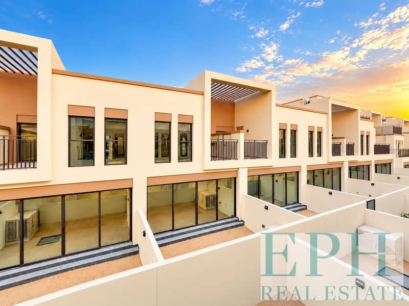 2 Modern Townhouses at Golden Sunset. png