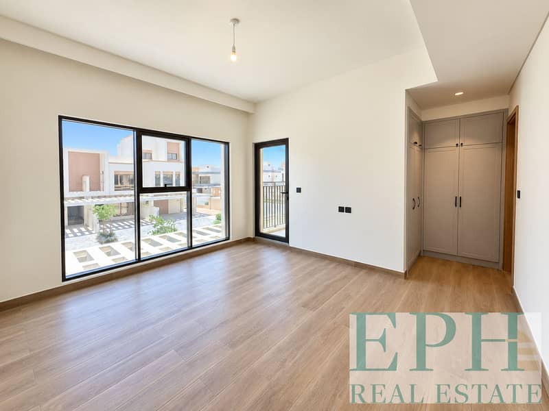 6 Bright Modern Room with Balcony View. png