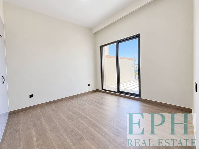 7 Bright Minimalist Room with Balcony Views. png
