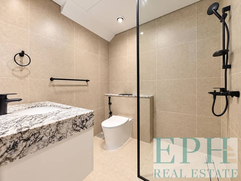 9 Modern Beige Bathroom with Marble Vanity. png