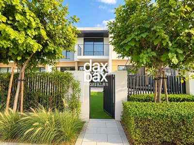 3 Schlafzimmer Villa zum Miete in The Valley by Emaar, Dubai - Modern Townhouse Entrance with Lush Landscaping. png 3 Schlafzimmer Villa zum Miete in The Valley by Emaar, Dubai - Modern Townhouse Entrance with Lush Landscaping. png