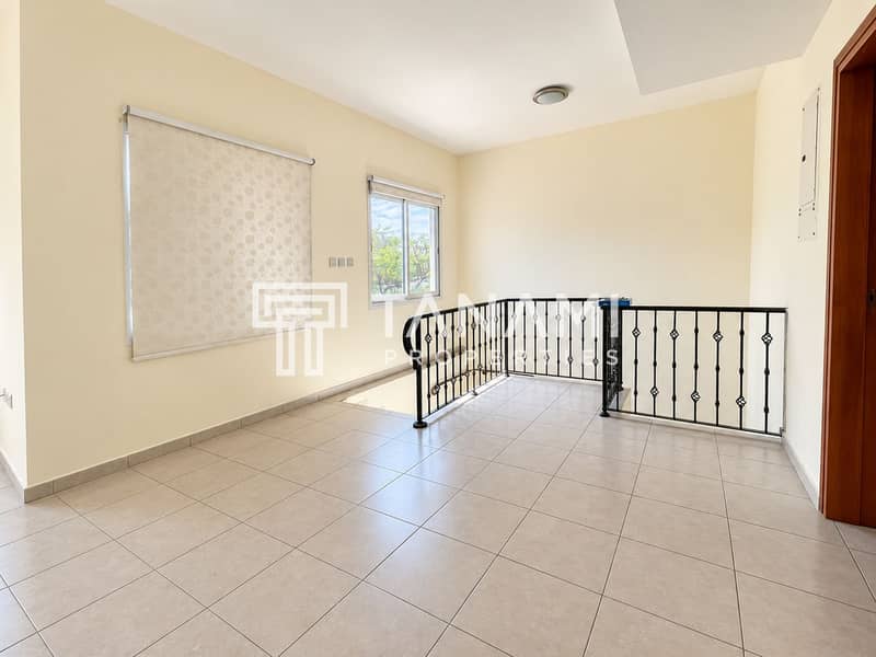 8 Bright Minimalist Loft Landing with Stair Railing. png