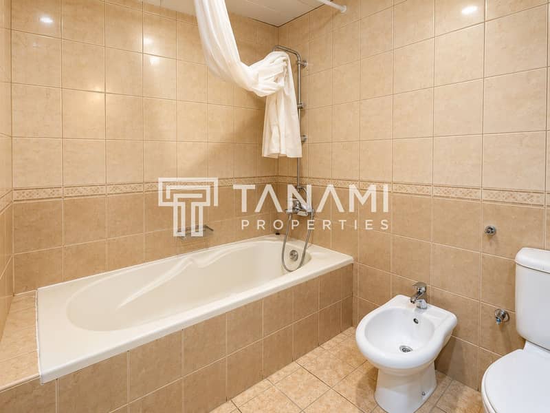 17 Warm Beige Tiled Bathroom Interior. png