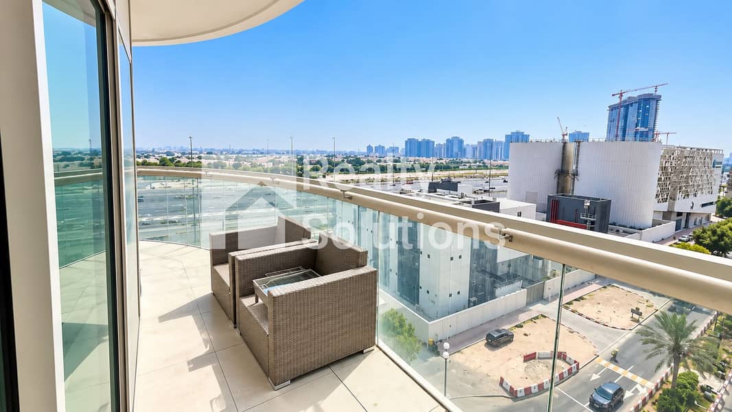2 Sunlit Balcony Overlooking the City skyline. png