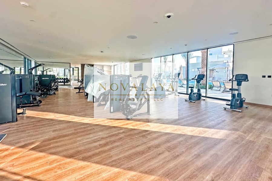 10 Gym floor cleared beside exercise bikes. png