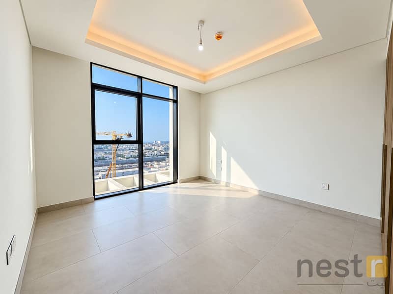 8 Sunlit Modern Room with City Views. png