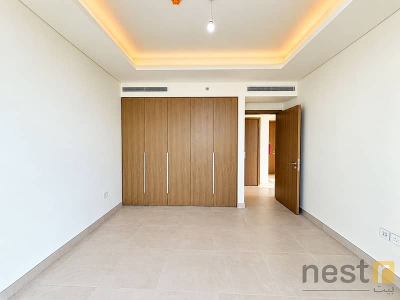 9 Modern Minimalist Bedroom with Warm Cove Lighting. png