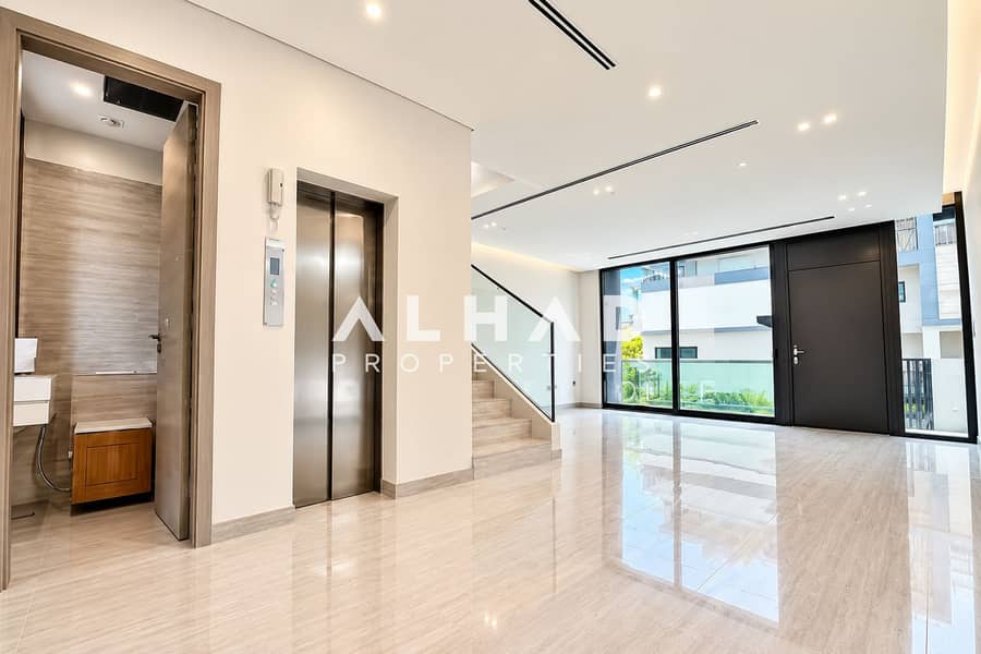 6 Modern Minimalist Foyer with Glass Staircase. png