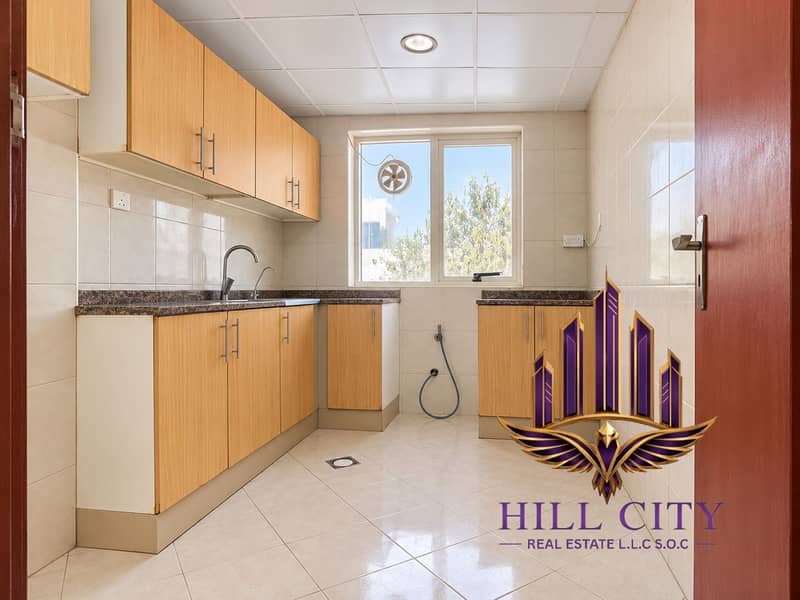 3 Bright honey-wood kitchen interior. png