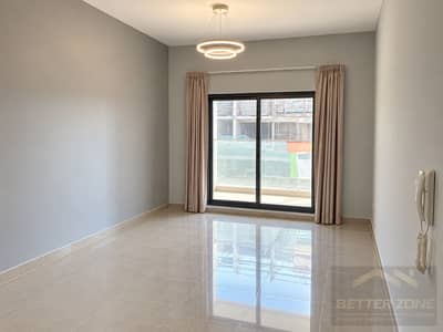1 Bedroom Flat for Rent in Dubai South, Dubai - Minimalist Living Room with Balcony Views. png 1 Bedroom Flat for Rent in Dubai South, Dubai - Minimalist Living Room with Balcony Views. png