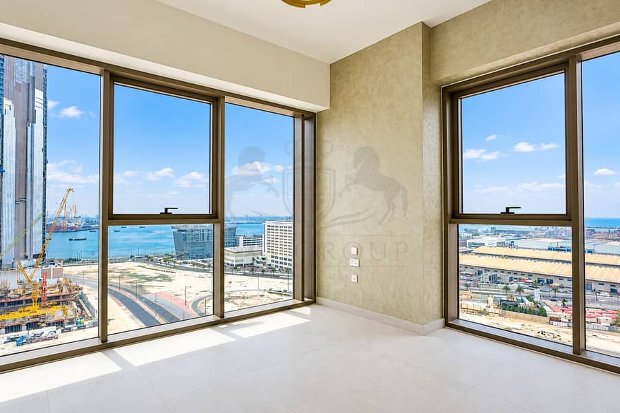 3 Sunlit Modern Room Overlooking Harbor. png