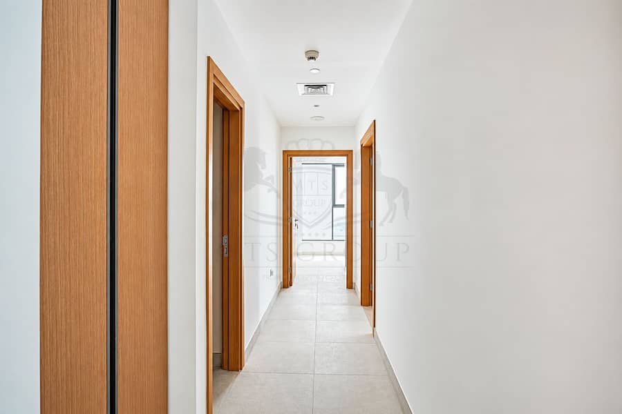 12 Modern Hallway with Warm Wood Accents. png