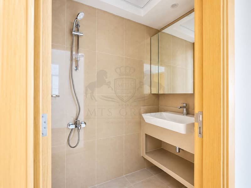 17 Modern Beige-Tiled Bathroom Interior (1). png
