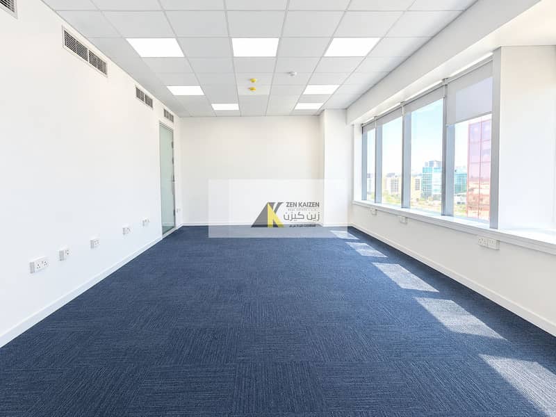 Bright Empty Modern Office with City Views. png Bright Empty Modern Office with City Views. png