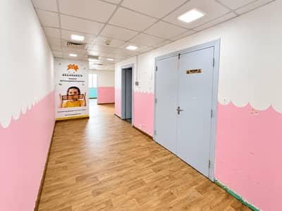 مکتب للايجار في الكرامة، دبي - Pastel Educational Hallway with Brainobrain Poster. png مکتب للايجار في الكرامة، دبي - Pastel Educational Hallway with Brainobrain Poster. png