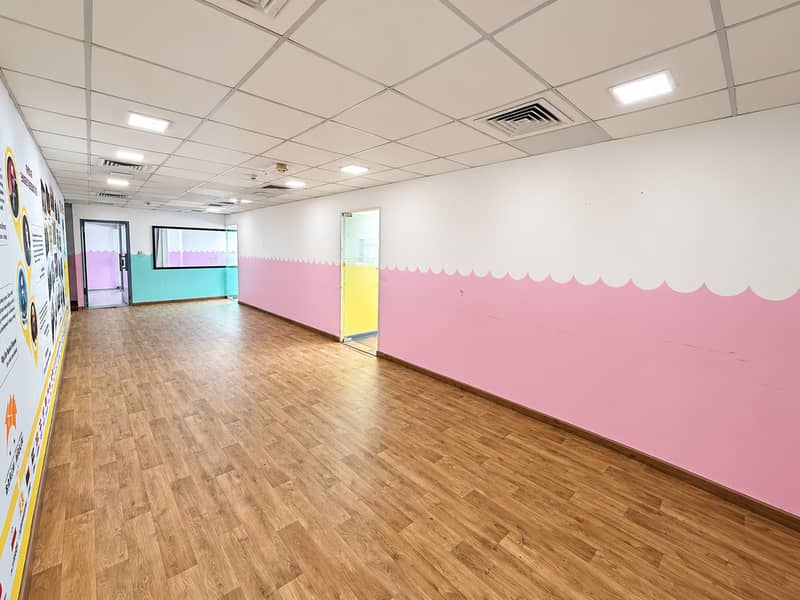 2 Pastel School Hallway with Mural. png