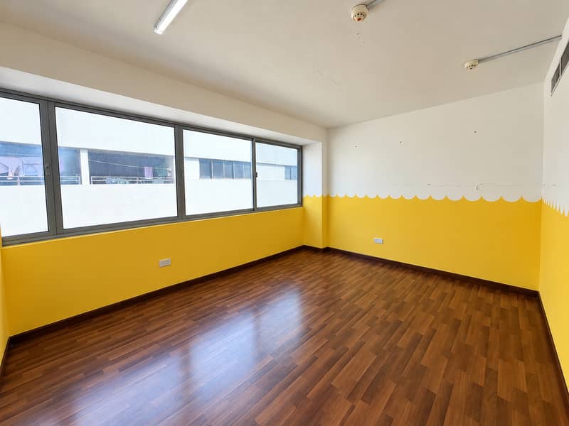 6 Empty Yellow-and-White Room with Windows. png