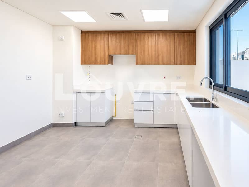 8 Minimalist White and Wood Kitchen. png