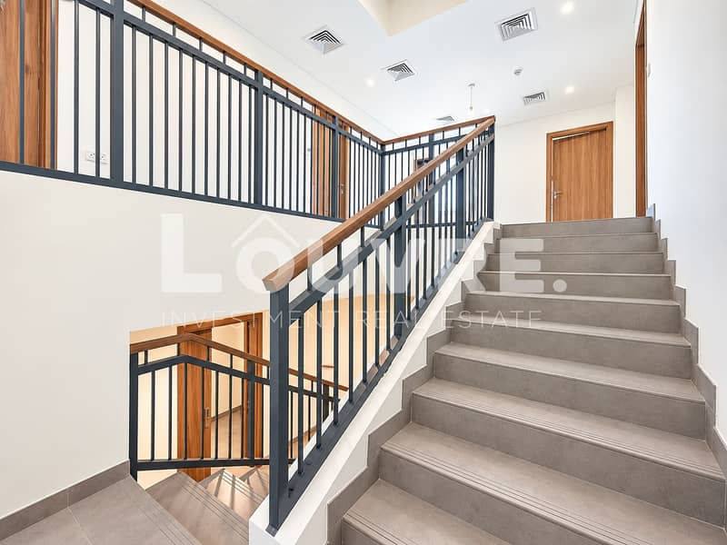 11 Modern Minimalist Stairwell with Warm Wood Accents. png