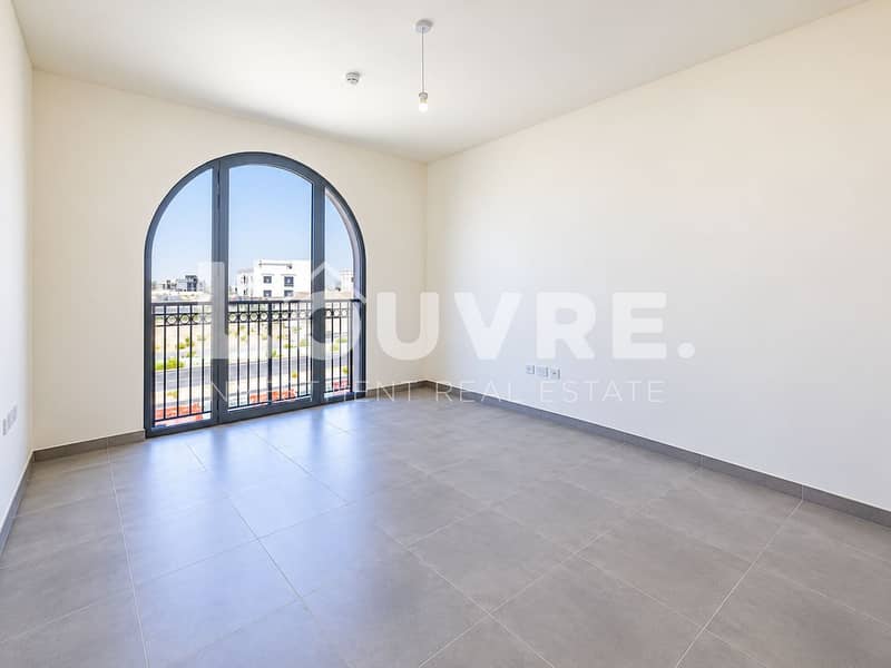 13 Minimalist Room with Arched Balcony Window. png