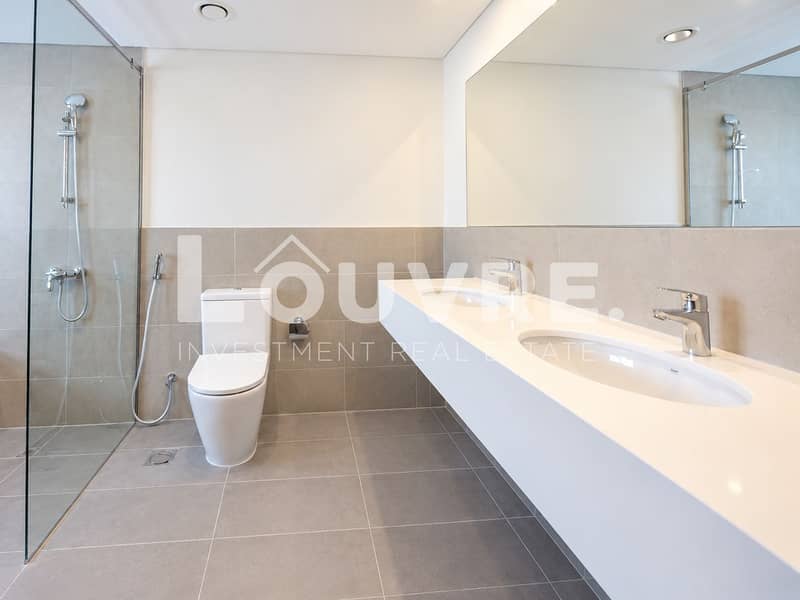 17 Modern Minimalist Bathroom with Double Vanity. png