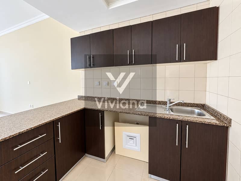 10 Modern Espresso Kitchen with Granite Counters. png