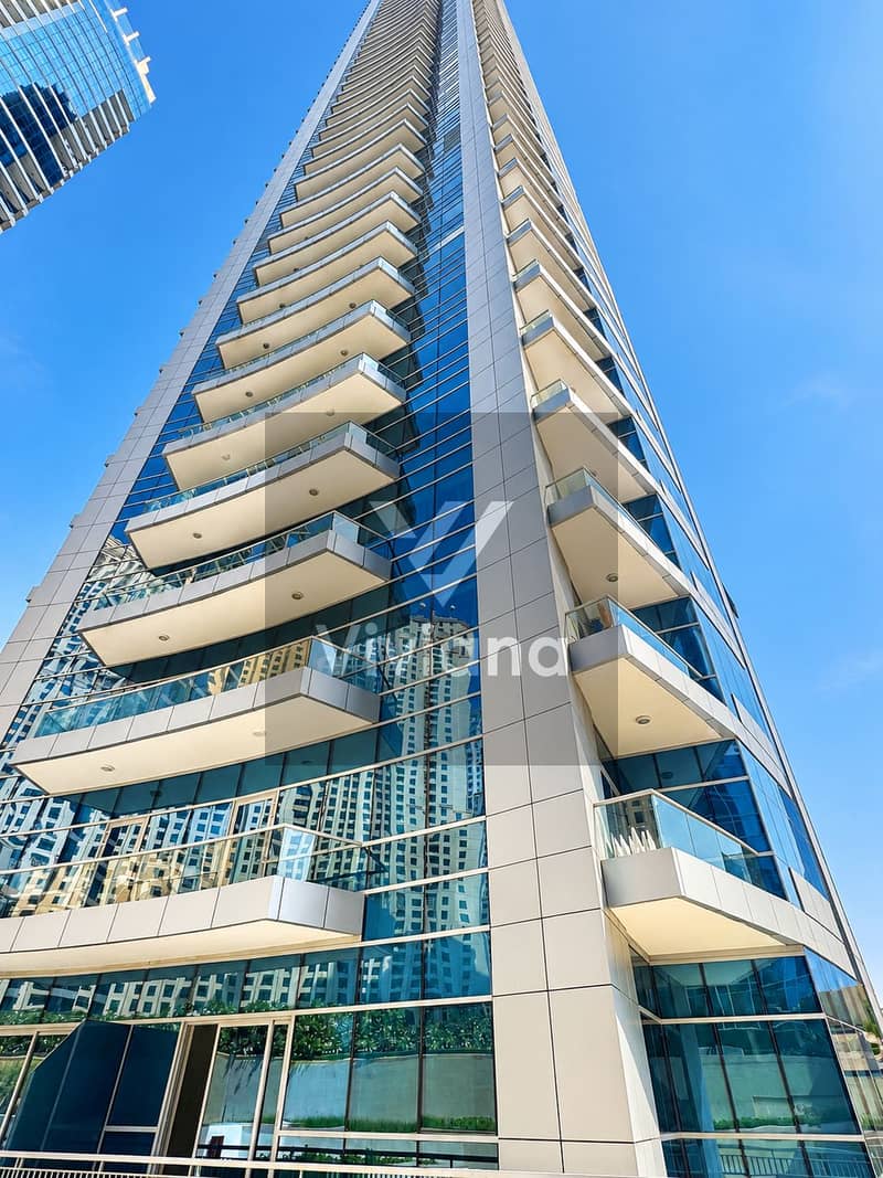 13 Looking Up at a Modern Glass Tower. png