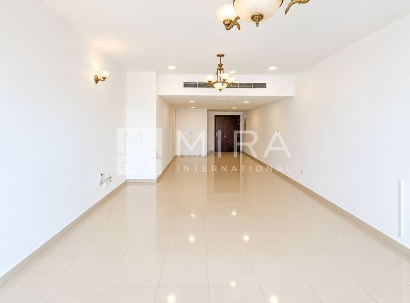 Bright Empty Apartment with Brass Chandeliers Bright Empty Apartment with Brass Chandeliers