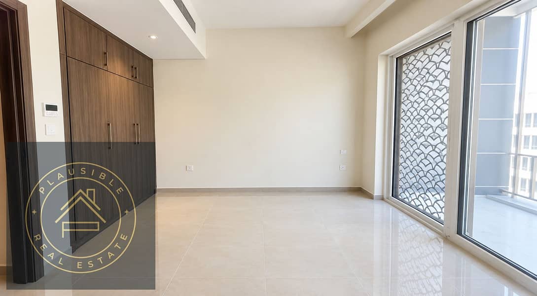 7 Minimalist Room with Wardrobe and Balcony Window. png