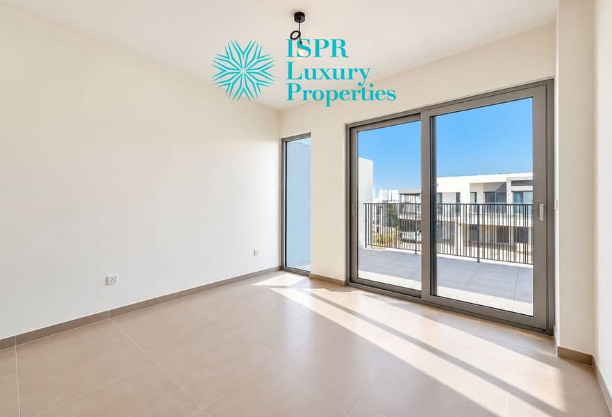 5 Sunlit Minimalist Room with Balcony Views. png