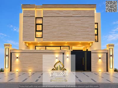 4 Bedroom Villa for Sale in Al Helio, Ajman - واجهة فيلا فاخرة بإضاءة دافئة. jpg