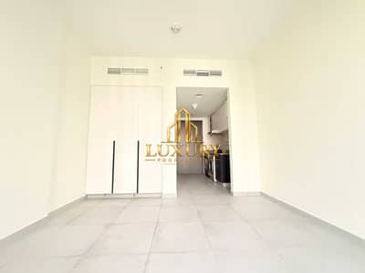 Studio for Rent in Aljada, Sharjah - Charming Garden View Studio Apartment | Aljada