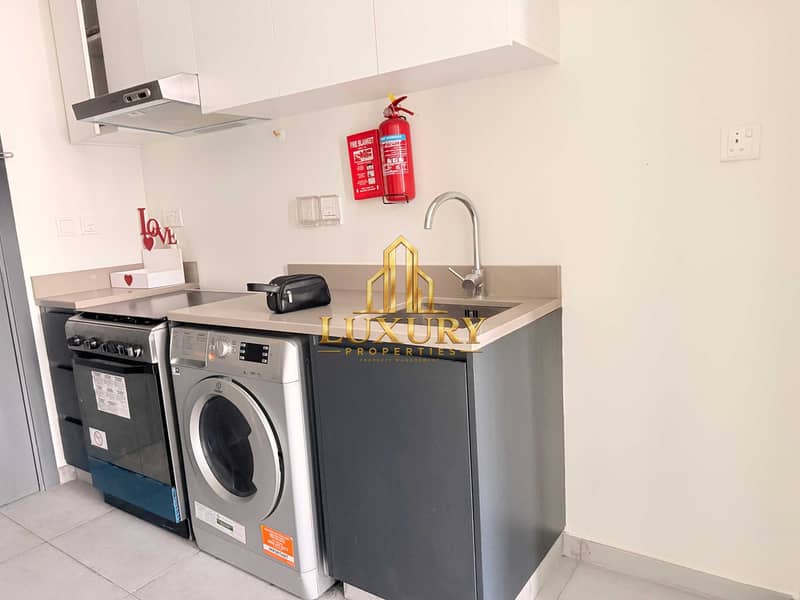 10 Charming Garden View Studio Apartment | Aljada
