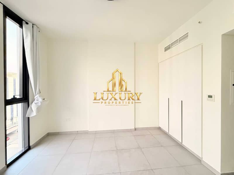12 Charming Garden View Studio Apartment | Aljada