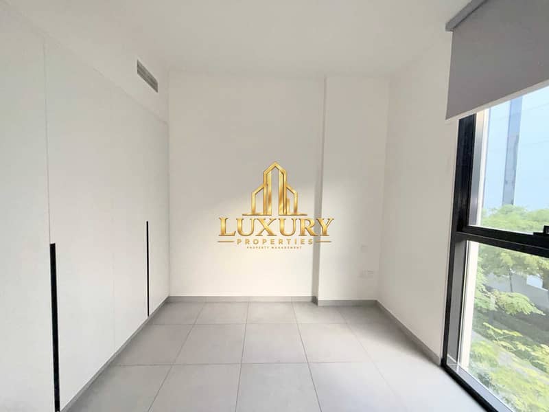 9 Modern 1-Bedroom Apartment with Garden View | Aljada