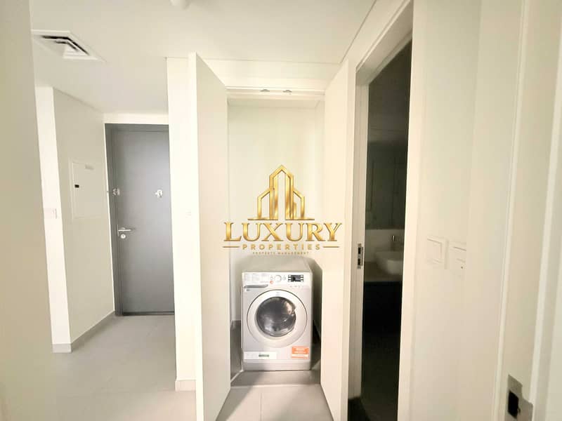10 Modern 1-Bedroom Apartment with Garden View | Aljada