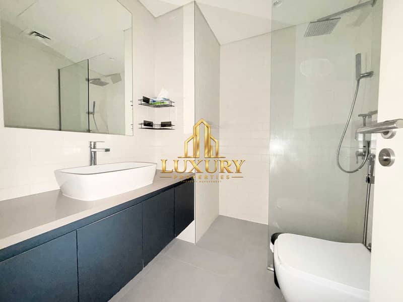 12 Modern 1-Bedroom Apartment with Garden View | Aljada