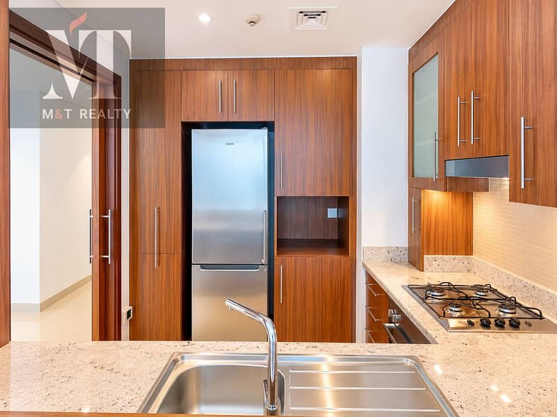 5 Modern Warm Wood Kitchen Interior. png