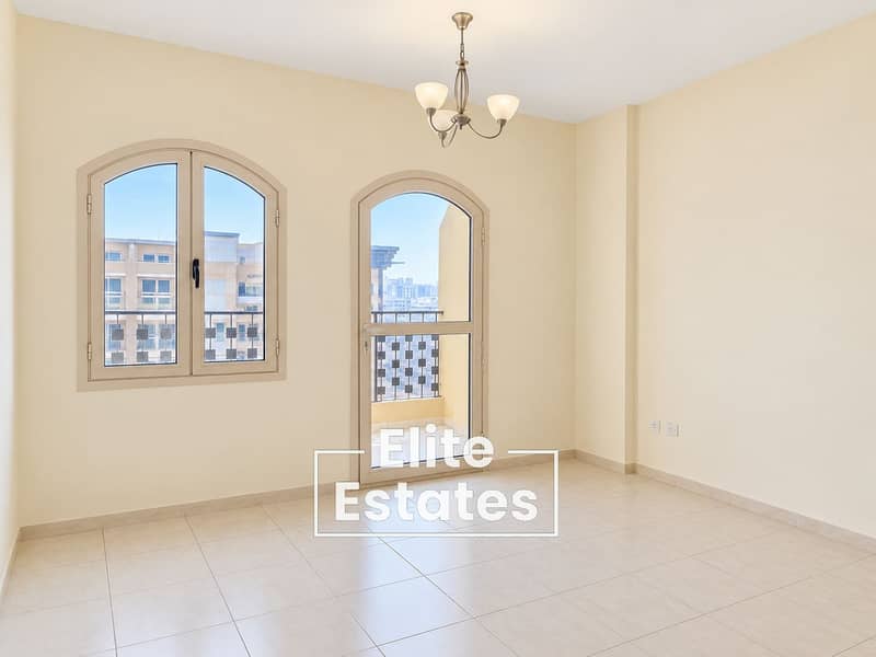 4 Bright Minimalist Room with Arched Balcony Windows. png