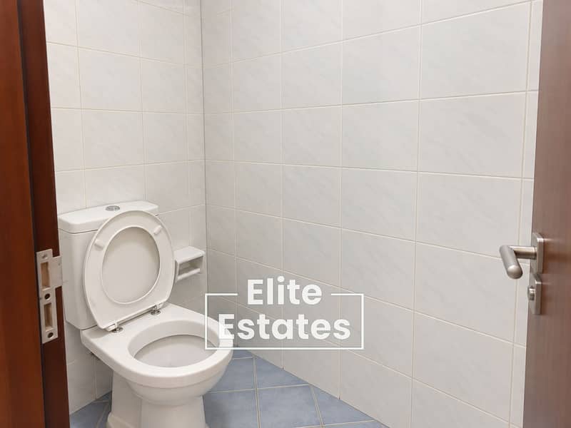 10 Minimal Marble-Tiled Bathroom Interior. png
