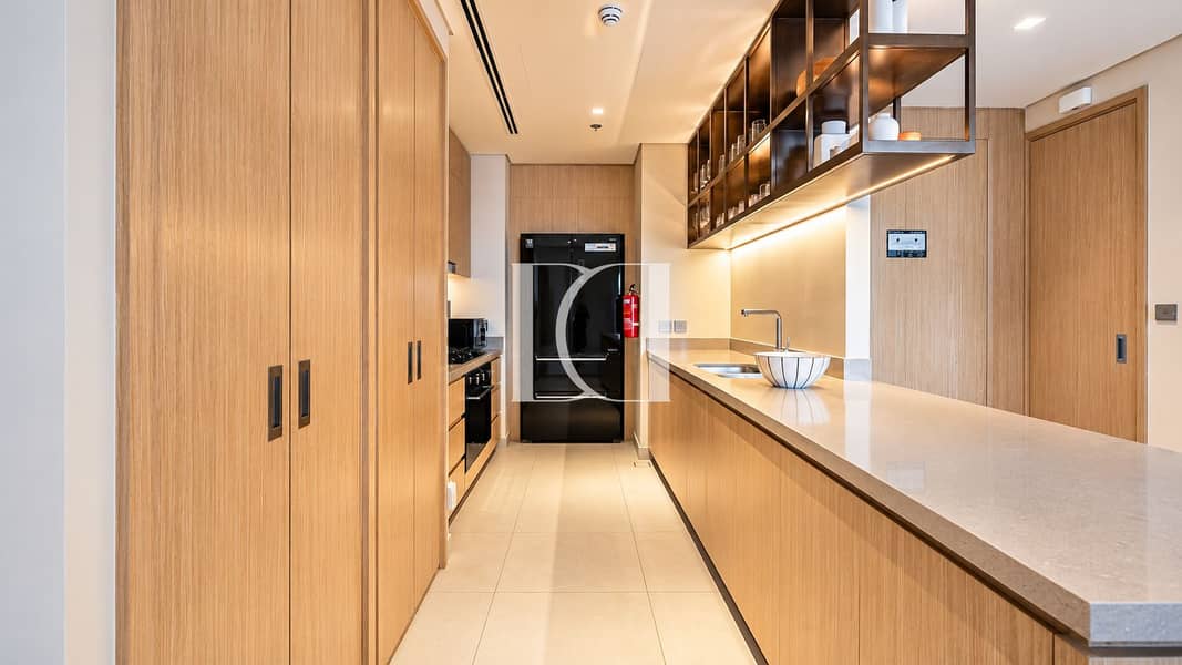 7 Warm Minimalist Galley Kitchen. png