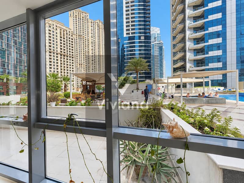 14 Sunny Courtyard Poolside Skyline View. png