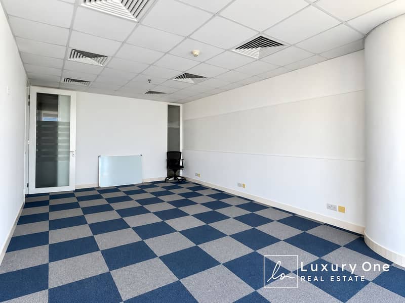 7 Bright Minimalist Office Interior with Checkerboard Carpet. png