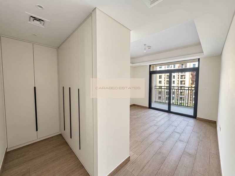 7 Sunlit Empty Bedroom with Wardrobe Alcove. png