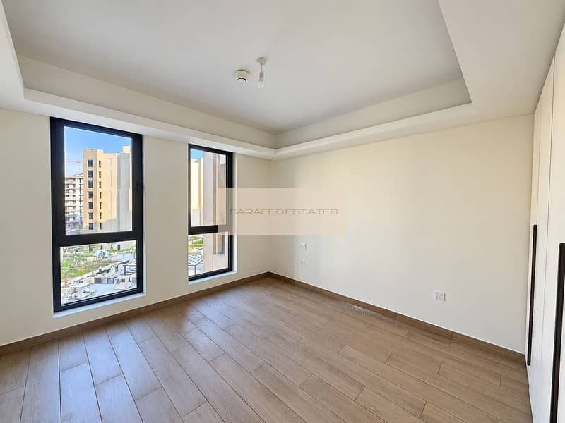 9 Bright empty bedroom with courtyard views. png