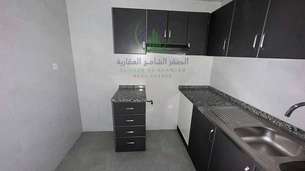 11 apartment-for-rent-2-bedroom-almjaz2-alsharqh-kitchen-16. jpg