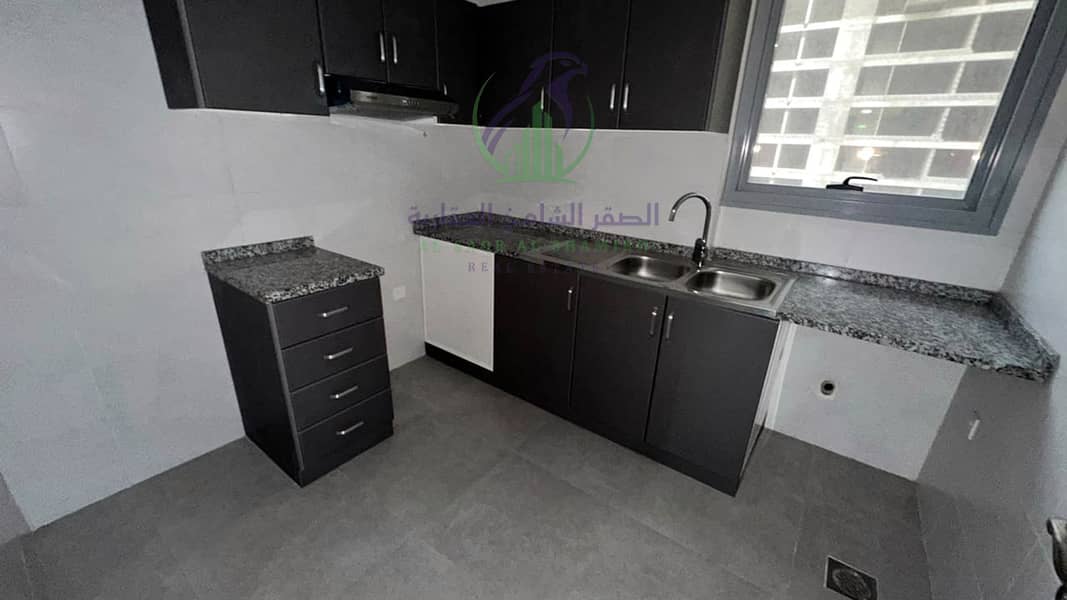 13 apartment-for-rent-2-bedroom-almjaz2-alsharqh-kitchen-06. jpg