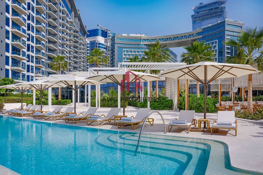 8 NH_Collection_Dubai_The_Palm__Image 305 West Beach Pool. jpeg